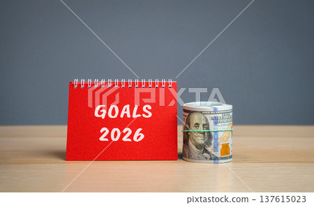 Financial planning, plans and tasks. Startup and achievements. Setting goal. Motivation, inspiration. Notes with words Goals 2026 and dollars money. Financial planning, plans and tasks. Startup and achievements. Setting goal. Motivation, inspiration. Notes with words Goals 2026 and dollars money. 137615023