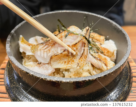 Nodoguro is a famous fish in Ishikawa Prefecture. "Nodoguro rice" is made by placing grilled fillets of Nodoguro on rice. Nodoguro is a famous fish in Ishikawa Prefecture. "Nodoguro rice" is made by placing grilled fillets of Nodoguro on rice. 137615232