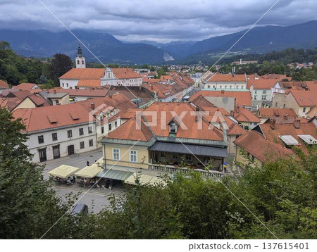 Scenic panoramic view of the town of Kamnik with the old castle on the hill in Slovenia Scenic panoramic view of the town of Kamnik with the old castle on the hill in Slovenia 137615401