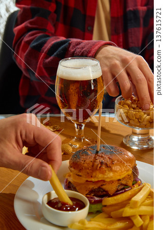 Burger fries and beer casual pub dinner concept 137615721
