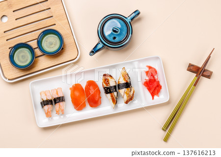 Sushi set with tea and small teapot Sushi set with tea and small teapot 137616213