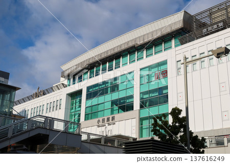 Odawara Station building with station sign and LUSCA shopping mall logo in Kanagawa, Japan 137616249