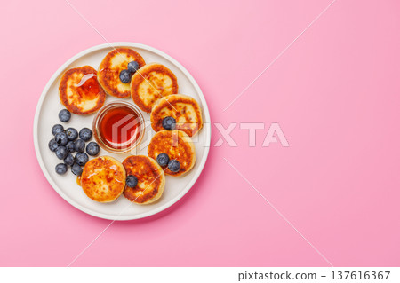 Homemade pancakes with blueberries and syrup Homemade pancakes with blueberries and syrup 137616367