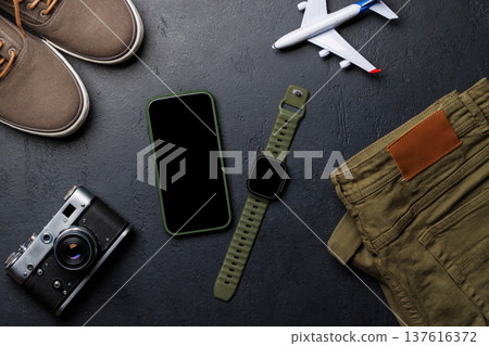 Safari clothing and gear with smartphone Safari clothing and gear with smartphone 137616372