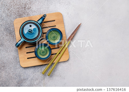 Asian tea ceremony set with teapot and cups Asian tea ceremony set with teapot and cups 137616416