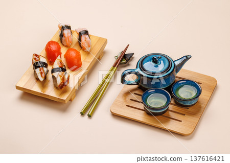 Sushi set with tea and small teapot Sushi set with tea and small teapot 137616421