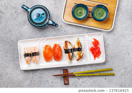 Sushi set with tea and small teapot Sushi set with tea and small teapot 137616425