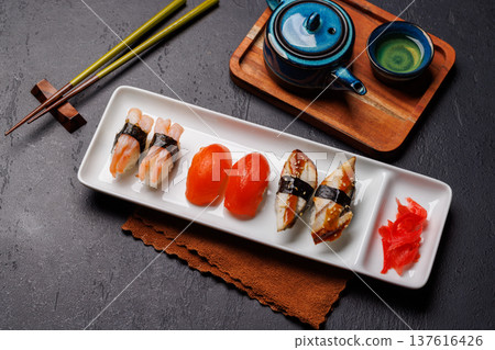Sushi set with tea and small teapot Sushi set with tea and small teapot 137616426