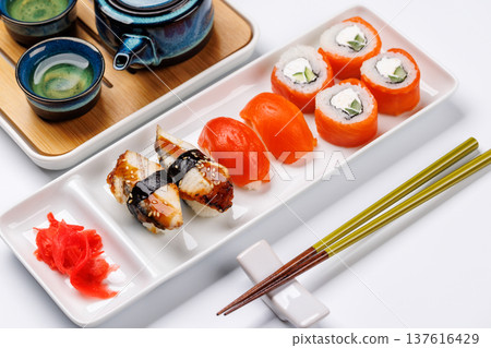 Sushi set with tea and small teapot Sushi set with tea and small teapot 137616429
