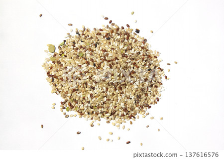 These are grains of mixed grain placed on a white background. These are grains of mixed grain placed on a white background. 137616576