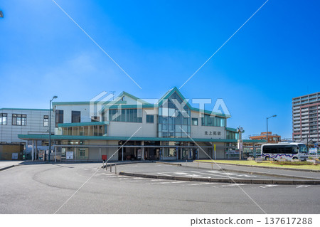 JR Takasaki Line Kita-Ageo Station exterior and rotary Blue sky and station front view 137617288