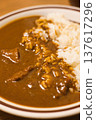 Delicious curry rice served in a bowl 137617296