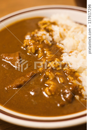 Delicious curry rice served in a bowl 137617296