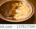 Delicious curry rice served in a bowl 137617300
