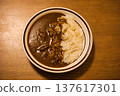 Delicious curry rice served in a bowl 137617301