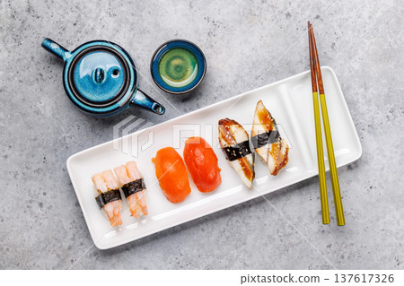 Sushi set with tea and small teapot Sushi set with tea and small teapot 137617326