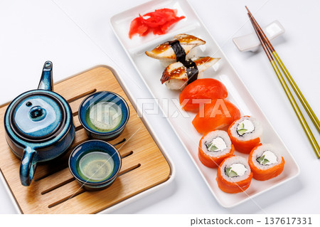 Sushi set with tea and small teapot Sushi set with tea and small teapot 137617331