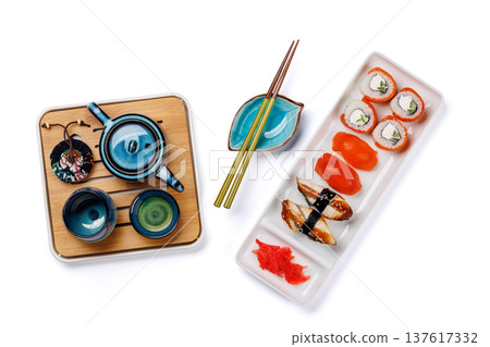 Sushi set with tea and small teapot Sushi set with tea and small teapot 137617332