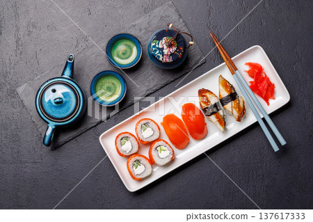 Sushi set with tea and small teapot Sushi set with tea and small teapot 137617333