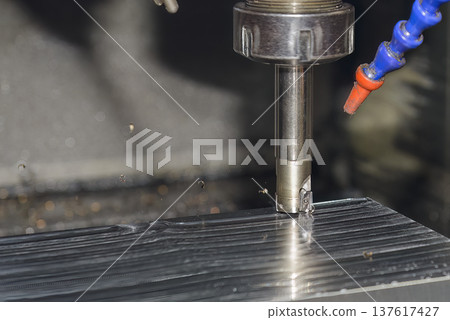 Heavy-duty rough cutting process on a CNC milling machine using an indexable tool to shape mold components. Heavy-duty rough cutting process on a CNC milling machine using an indexable tool to shape mold components. 137617427