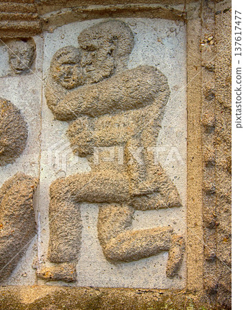 Ancient bas-reliefs on the Windows and walls of historical buildings 137617477