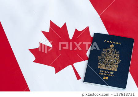 Passport of Canada on the background of a Canadian flag 137618731
