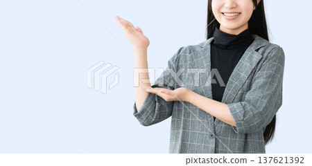 A young woman/businesswoman giving directions 137621392