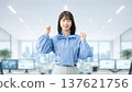 Woman/businesswoman doing a fist pump Woman/businesswoman doing a fist pump 137621756