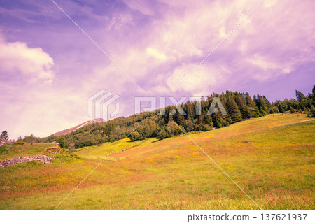 Mountainside against the sunset sky 137621937