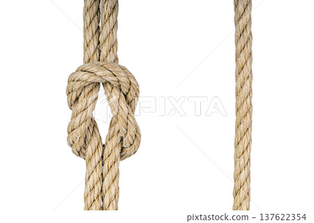 Intricately Woven Natural Fiber Rope Knot Isolated on White Background Intricately Woven Natural Fiber Rope Knot Isolated on White Background 137622354