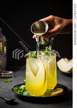 Melon juice, lemonade in glasses 137623355