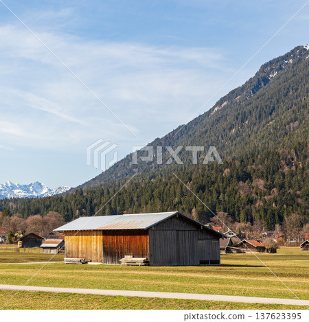 Rustic wooden barn in alpine meadow, Garmisch-Partenkirchen, Bavaria, Germany Rustic wooden barn in alpine meadow, Garmisch-Partenkirchen, Bavaria, Germany 137623395