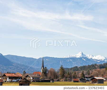 Village church with alpine mountain scenery in Garmisch-Partenkirchen, Bavaria, Germany 137623401