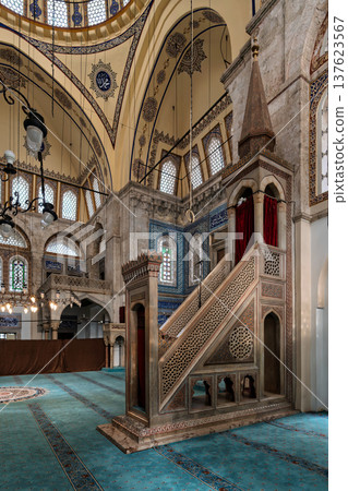 Interior of Muradiye Mosque, featuring ornate minbar, dome, intricate calligraphy, and blue carpet, Manisa, Turkey Interior of Muradiye Mosque, featuring ornate minbar, dome, intricate calligraphy, and blue carpet, Manisa, Turkey 137623567