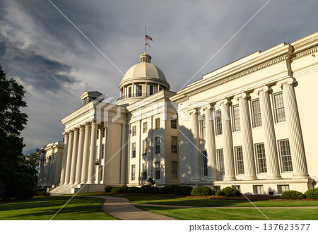Exterior view of the historic Alabama State Capitol building with neoclassical architecture and white columns in Montgomery. Exterior view of the historic Alabama State Capitol building with neoclassical architecture and white columns in Montgomery. 137623577