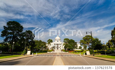A wide angle view of the historic Alabama State Capitol building with its white dome and neoclassical architecture from Dexter Avenue in Montgomery, United States A wide angle view of the historic Alabama State Capitol building with its white dome and neoclassical architecture from Dexter Avenue in Montgomery, United States 137623578