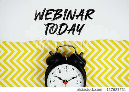 Webinar Today text written on paper rip with alarm clock flat lay on yellow chevron background Webinar Today text written on paper rip with alarm clock flat lay on yellow chevron background 137623761
