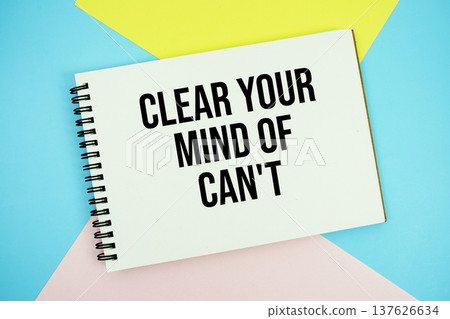 Clear Your Mind of Can't text written on notepad flat lay on multicolor pastel background Clear Your Mind of Can't text written on notepad flat lay on multicolor pastel background 137626634