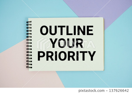 Outline Your Priority text written on notepad flat lay on multicolor pastel background Outline Your Priority text written on notepad flat lay on multicolor pastel background 137626642
