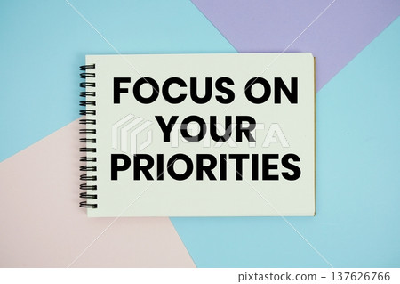 Focus on Your Priorities text written on notepad flat lay on multicolor pastel background Focus on Your Priorities text written on notepad flat lay on multicolor pastel background 137626766