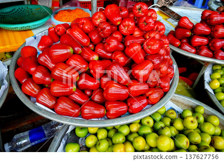 Chompoo (Pink Apple or Wax Apple) and Jujube (Chinese Date): Greenish-yellow, round fruits  137627756