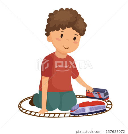 Boy Playing with a Toy Train 137628072