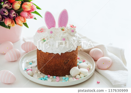 Easter Cake with Bunny Ears and Tulips. Festive Spring Composition 137630999