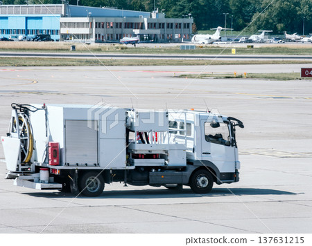 Airport Ground Support Vehicle on Runway Airport Ground Support Vehicle on Runway 137631215