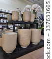 Ceramic flower pots on supermarket shelves. Ceramic products in flower shop 137631665
