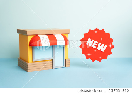 A store and a New sticker announcing new product arrivals. Grand opening of a retail location and expansion of business. Marketing campaign attracts customers to new goods and services. A store and a New sticker announcing new product arrivals. Grand opening of a retail location and expansion of business. Marketing campaign attracts customers to new goods and services. 137631860