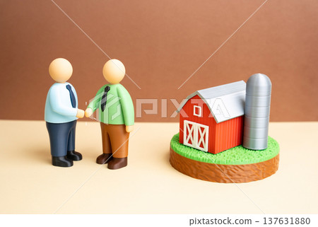Businessmen agree to sell a farm and land. Acquisition of agribusiness and agricultural assets. Investment in farmland and negotiation of a major real estate transaction. Businessmen agree to sell a farm and land. Acquisition of agribusiness and agricultural assets. Investment in farmland and negotiation of a major real estate transaction. 137631880