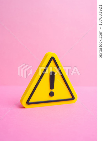 Yellow caution sign. Exclamation point in a yellow triangle. Warning, important information and safety alert symbol. Risk awareness, hazard notification and public safety communication 137631921