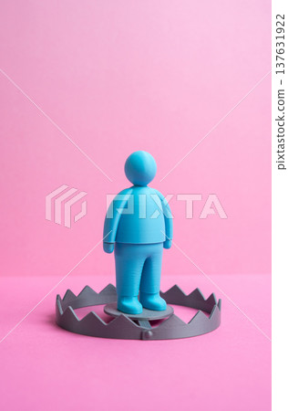 Blue human figure in the center of a trap. Dangerous situation close the trap. Get out of a difficult situation. Risks of dating and online communication for women, manipulation, fraud Blue human figure in the center of a trap. Dangerous situation close the trap. Get out of a difficult situation. Risks of dating and online communication for women, manipulation, fraud 137631922