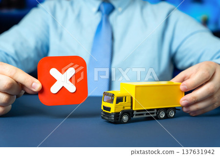 A truck and a red X symbolizing bans on work, entry and operations. Trade embargoes and tariff wars disrupt logistics. Restrictions on autonomous and driverless truck transportation. A truck and a red X symbolizing bans on work, entry and operations. Trade embargoes and tariff wars disrupt logistics. Restrictions on autonomous and driverless truck transportation. 137631942